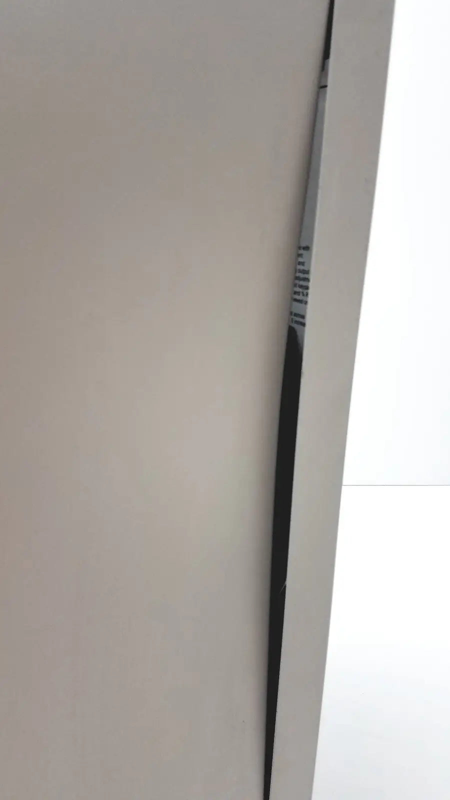 A sleek black knife with a sharp metallic blade and textured handle for the nortec humidifier nhtc 010 product
