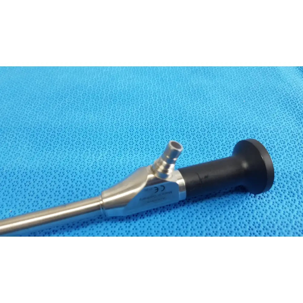 Silver novadaq sc9104 autoclavable laparoscope endoscope with black ergonomic handle and metallic joints