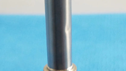 Novadaq sc9104 autoclavable laparoscope endoscope with a sleek silver cylindrical body and gold-toned base