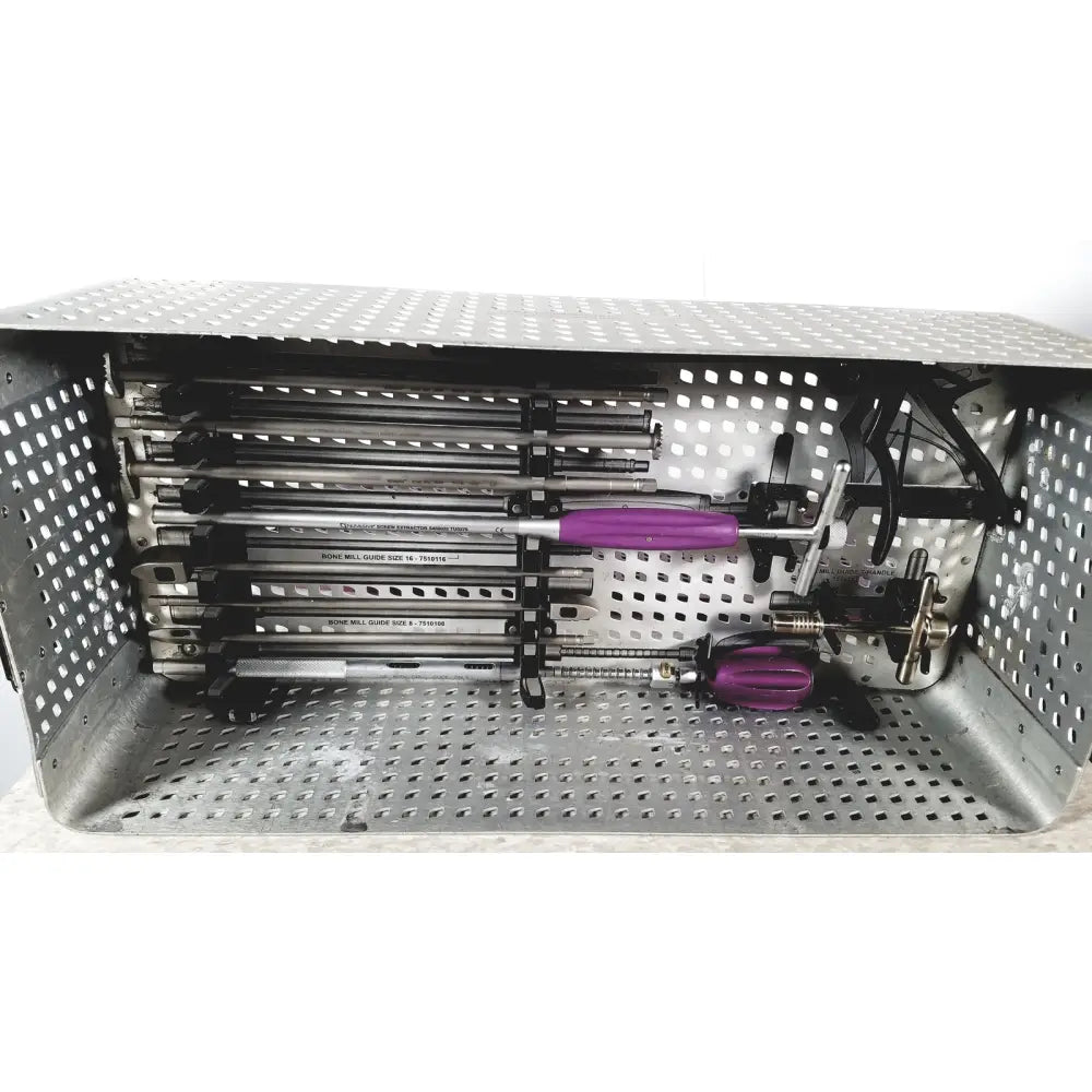 A metallic surgical instrument tray holding multiple purple-handled bone wall guides for nuvasive speed innovation coroent xl-fixation
