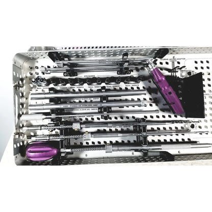 Purple-handled surgical drill with metallic shaft and textured grip in nuvasive speed innovation coroent xl-fixation tray