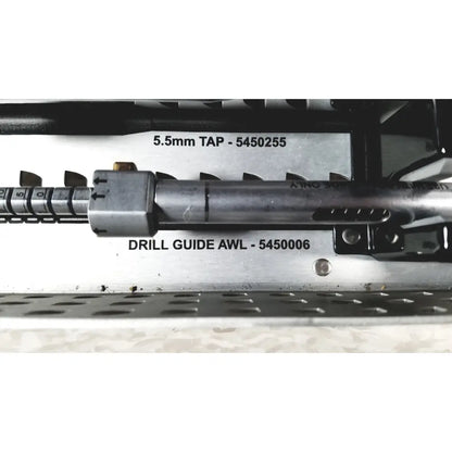 Silver metallic drill guide awl with engraved markings and textured grip in nuvasive speed innovation coroent xl-fixation tray