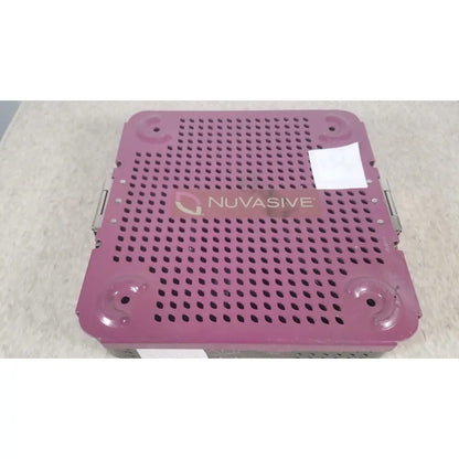 Purple perforated metal nuvasive xlif x1 instrument tray designed for surgical instrument storage and organization