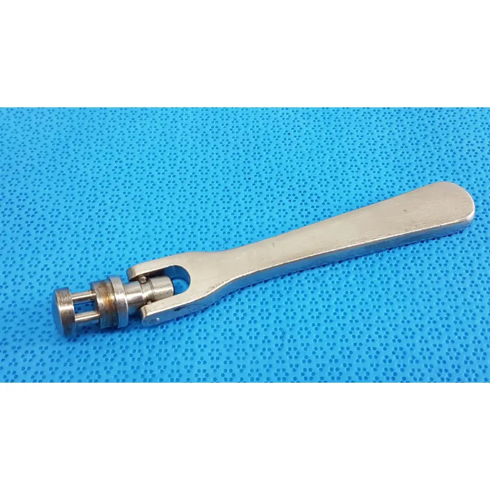 Silver metal octobase retractor handle with long forked end and adjustable components for surgical retractor positioning