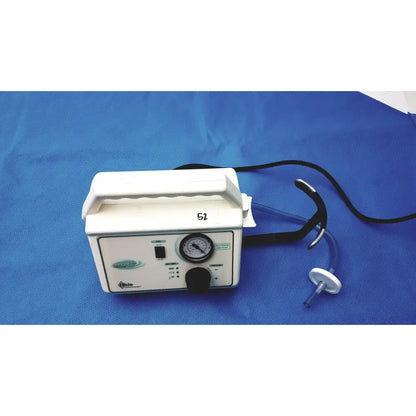 Ohio Care-E-VAC 3 white portable suction pump medical unit with pressure gauge and black tubing for easy use