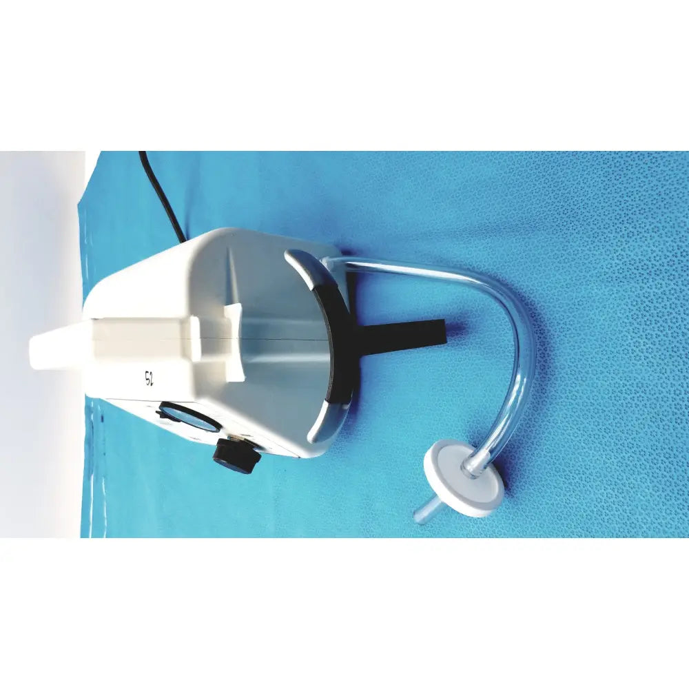 White and black Ohio Care-E-VAC 3 portable suction pump with curved metal tube for medical suction pump use