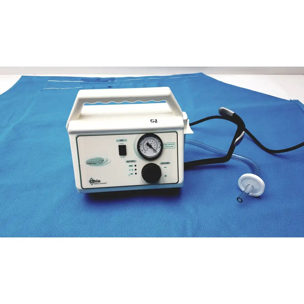 White ohio care-e-vac 3 portable suction pump medical unit with pressure gauge and control knobs for clinical use