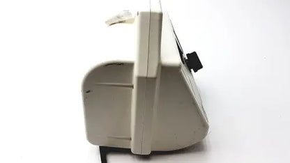 Beige plastic ohio medical care-e-vac 3 portable suction machine with black accents and visible bill slot for cash counting