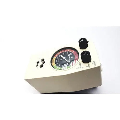 Cream-colored ohio medical products intermittent suction unit flow meter with black knobs and multicolor circular gauge