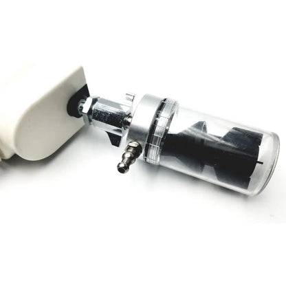 Clear cylindrical air filter with metallic silver top and black internals attached to white housing for ohio medical vacuum regulator model 1251