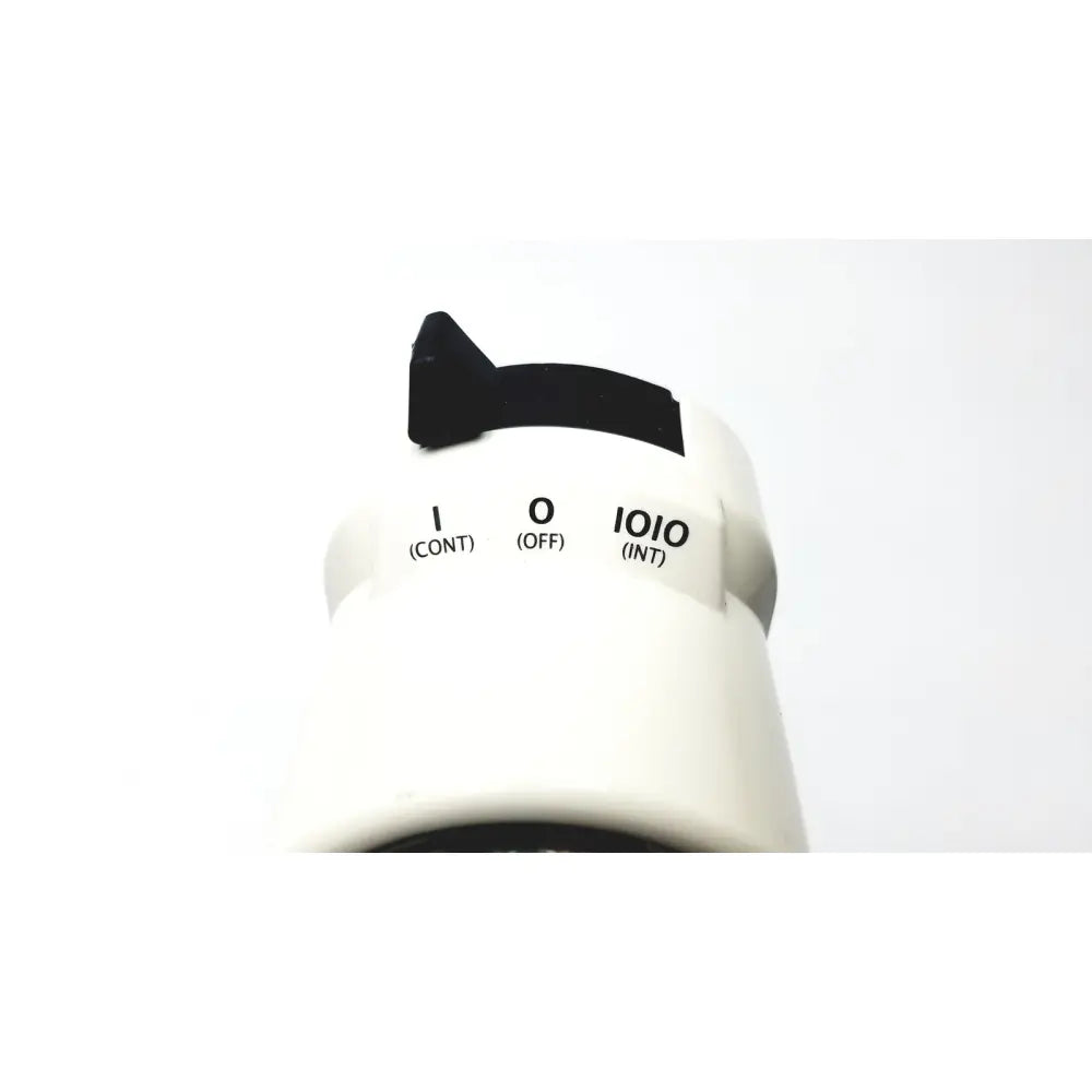 White cylindrical dial with black toggle switch and labeled settings on ohio medical vacuum regulator model 1251