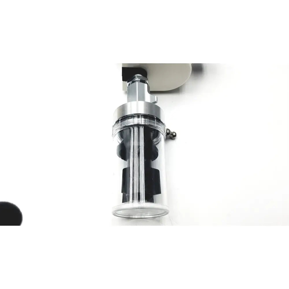 Clear cylindrical ohio vacuum regulator with silver metallic top and black internal components model PISA 200mmHg analog