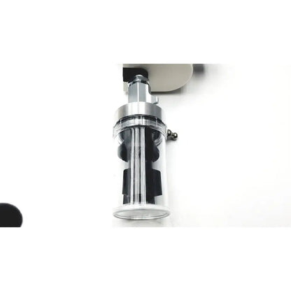Clear cylindrical ohio vacuum regulator with silver metallic top and black internal components model PISA 200mmHg analog