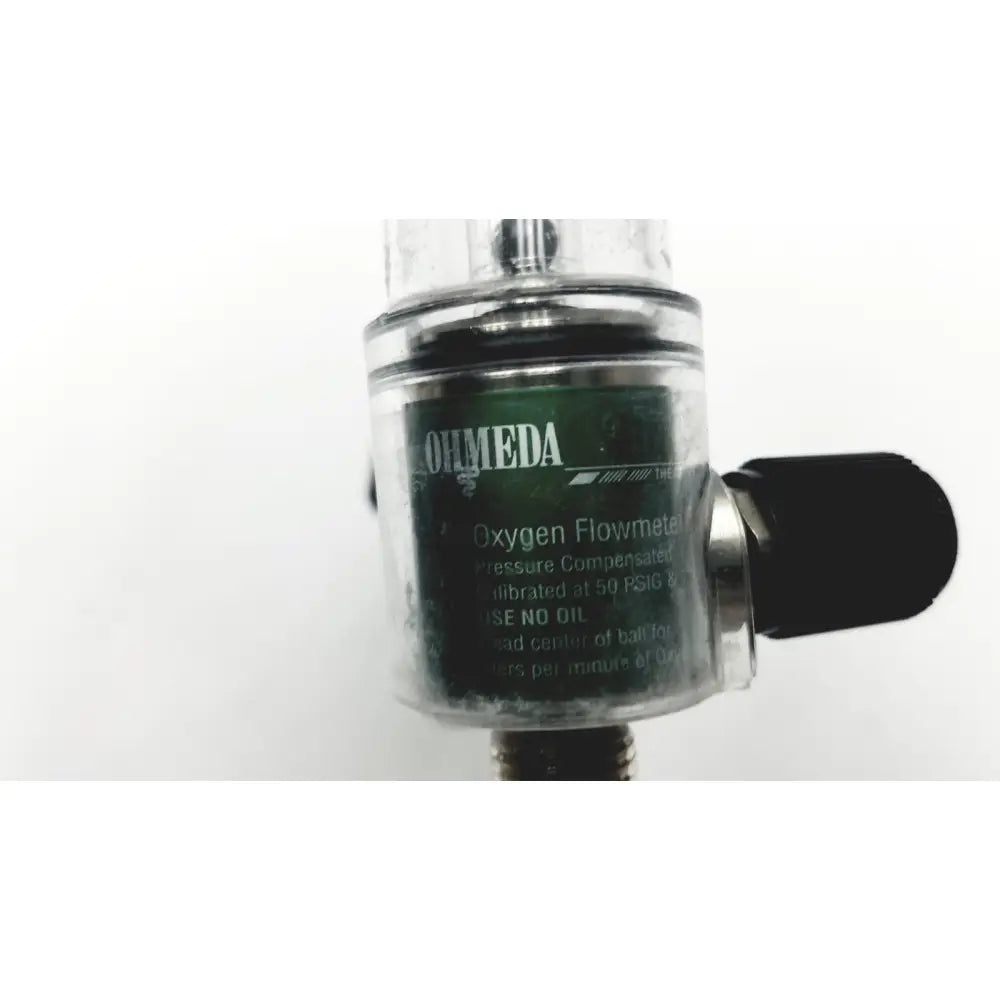 Clear plastic-cased ohmeda oxygen flowmeter ahe a30473 with black knob and green rohmeda label for medical use