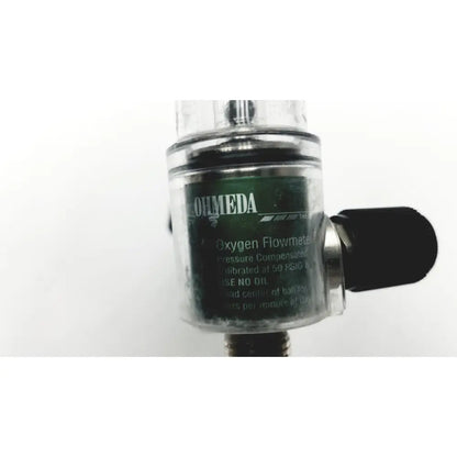Clear plastic-cased ohmeda oxygen flowmeter ahe a30473 with black knob and green rohmeda label for medical use