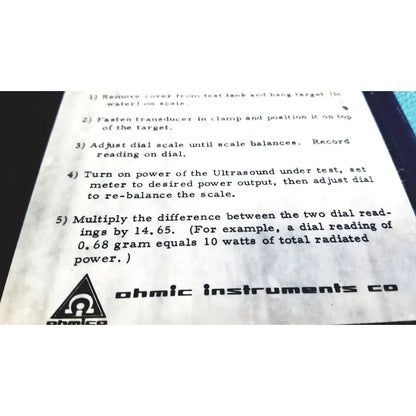 Black and white printed instruction sheet from ohmic instruments for the upm-30 ultrasound power meter scale