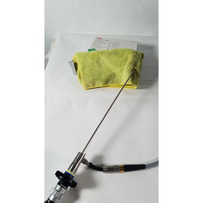 Olympus 4mm 70 degree rigid scope with long slender metallic shaft and black-handled control section medical endoscope