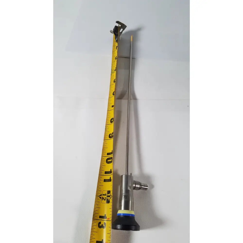 Silver olympus 4mm 70 degree rigid scope with metallic shaft and black yellow base featuring a small camera tip