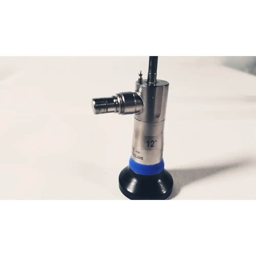 Silver metallic olympus a1931a autoclavable 4mm endoscope with blue rubber band and black base marked 12 degrees