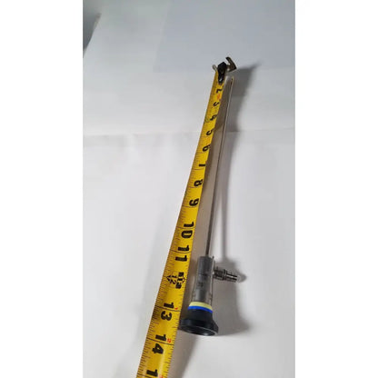 Olympus a1933a 4mm 70 degree metallic endoscope with black and silver body and yellow measurement tape