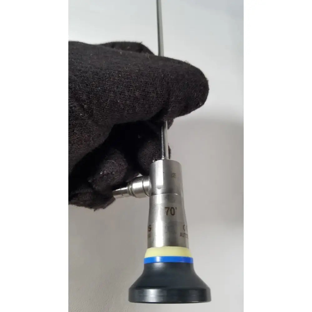 Silver surgical endoscope olympus a1933a 4mm with 70-degree angled tip black rubber grip and yellow-blue accent bands