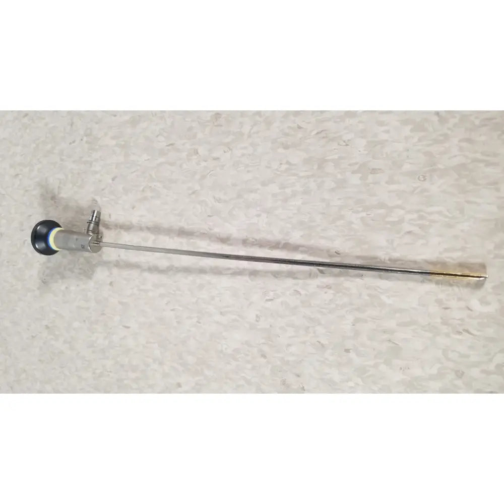 Silver olympus a1933a autoclavable surgical rigid endoscope with black and white capped tip angled at 70 degrees