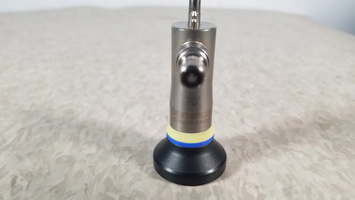 Silver metallic olympus a1933a autoclavable rigid scope with black base and yellow blue ring accent angled at 70 degrees