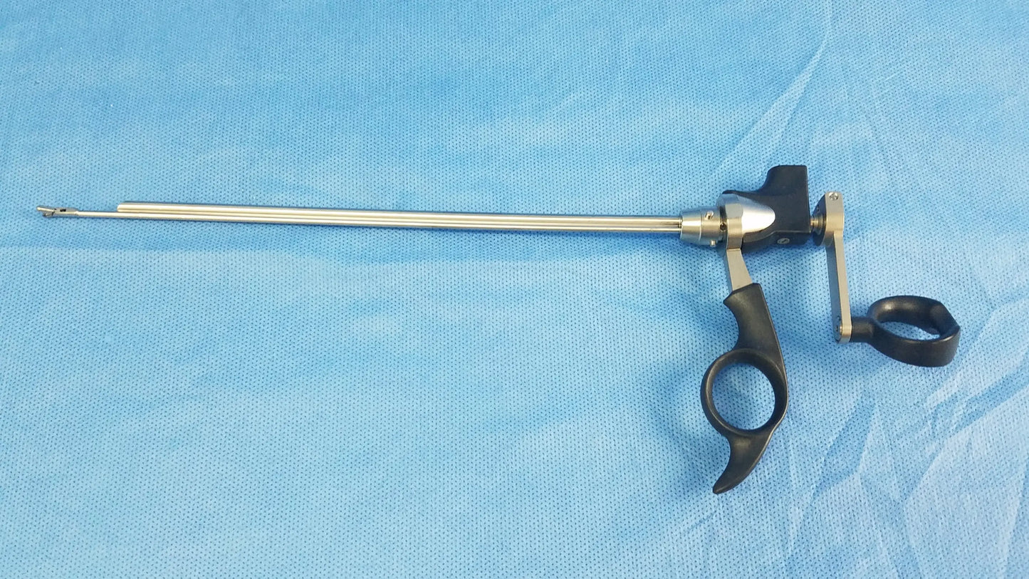 Black-handled Olympus A20713A optical biopsy spoon forceps with long metallic shaft and articulated joint for 30° telescope