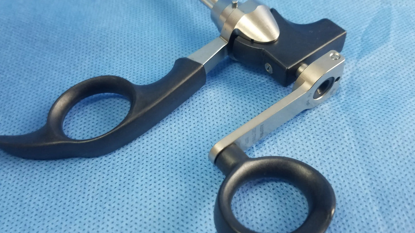 Black and silver olympus a20713a optical biopsy spoon forceps with ergonomic handles for 30° telescope use