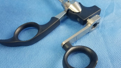 Black and silver olympus a20713a optical biopsy spoon forceps with ergonomic handles for 30° telescope use
