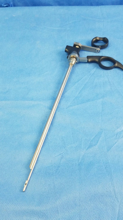 Black-handled olympus a20713a optical biopsy spoon forceps with long slender metallic shaft and articulated joint mechanism