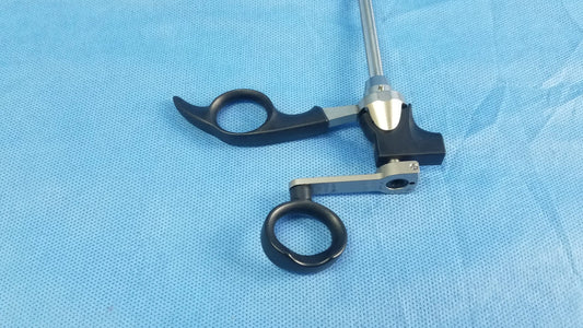 Black and silver Olympus A20713A optical biopsy spoon forceps with ergonomic handles for 30° telescope use