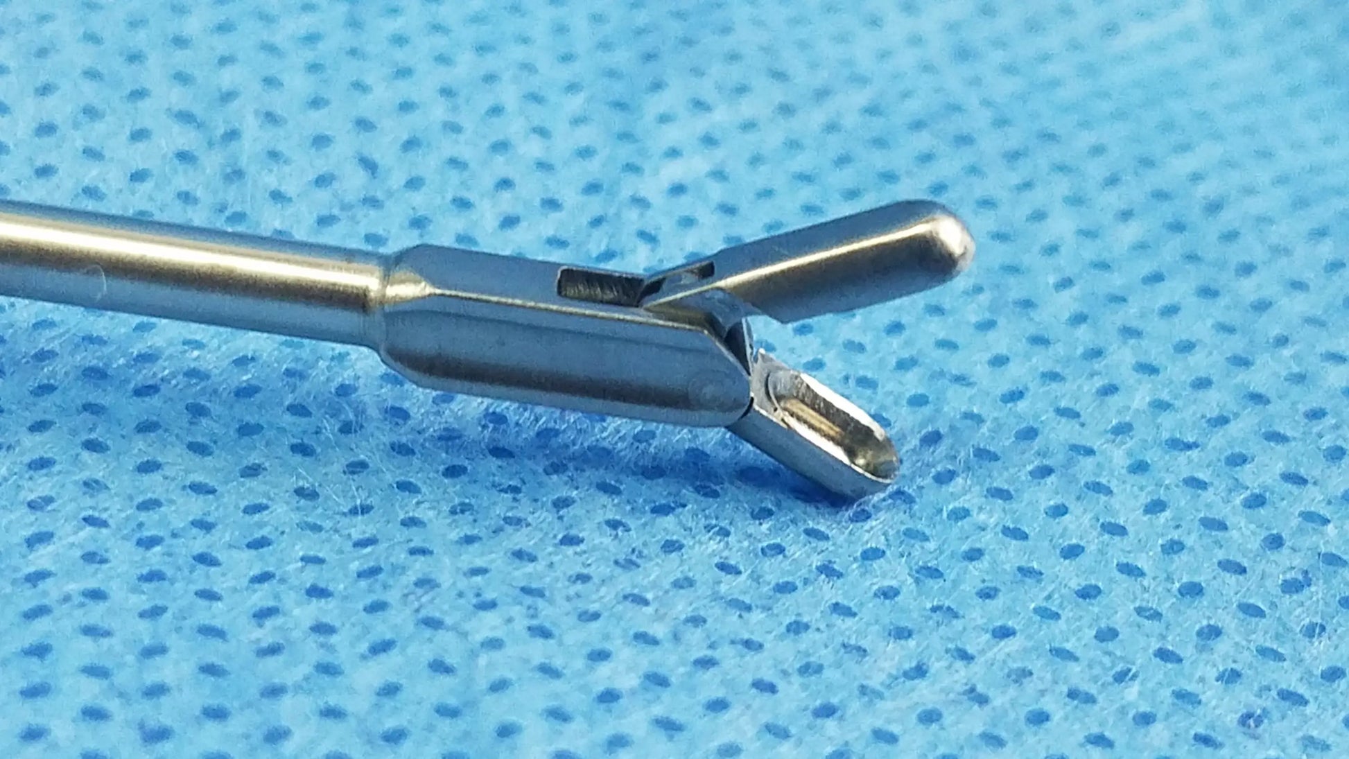 Silver olympus a20713a optical biopsy spoon forceps with sleek metallic finish and precision jaws for 30° telescope