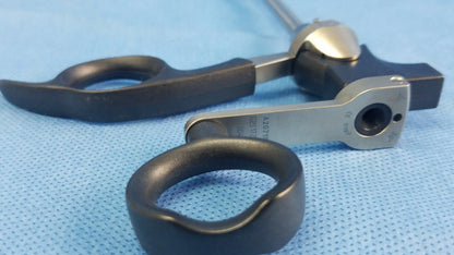 Olympus A20718A optical grasping forceps with black and silver ergonomic handles and precision-engineered shaft