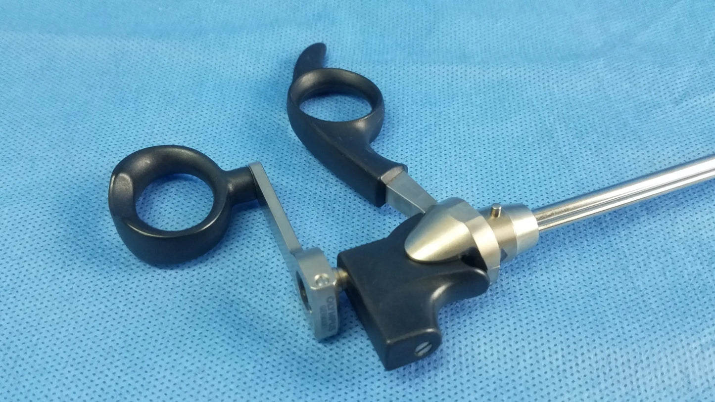 Olympus A20718A optical grasping forceps with black ergonomic handles and a long silver metallic shaft for precise grasping