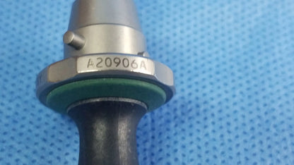 Silver metallic standard obturator instrument component with green rubber seal and engraved model number compatible olympus