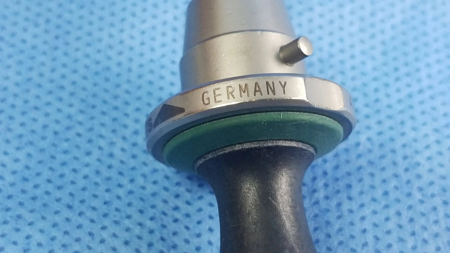 Silver metallic standard obturator instrument component with green seal and black handle compatible olympus germany mark