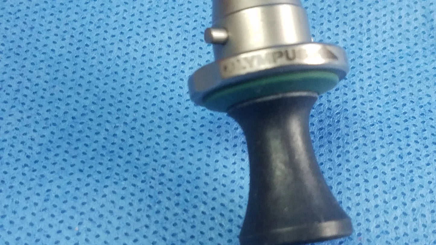 Silver Olympus A20906A standard obturator surgical instrument with black rubberized grip and metallic threading compatible Olympus