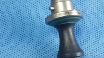 Silver Olympus A20906A standard obturator surgical instrument with black rubberized grip and metallic threading compatible Olympus