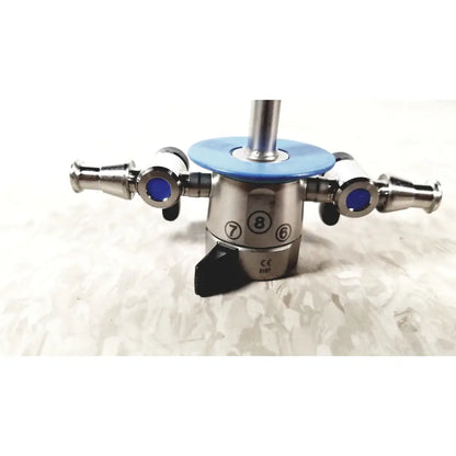 Stainless steel surgical instrument with blue circular caps and numbered markings olympus a20933a 21fr blue sheath obturator