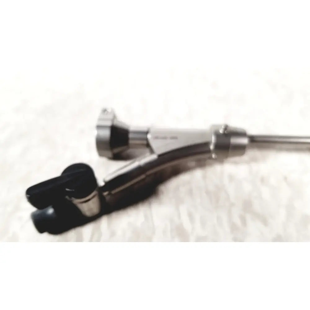 Silver-colored olympus a20975a endoscope bridge with black rubberized grip and articulated joints for medical use