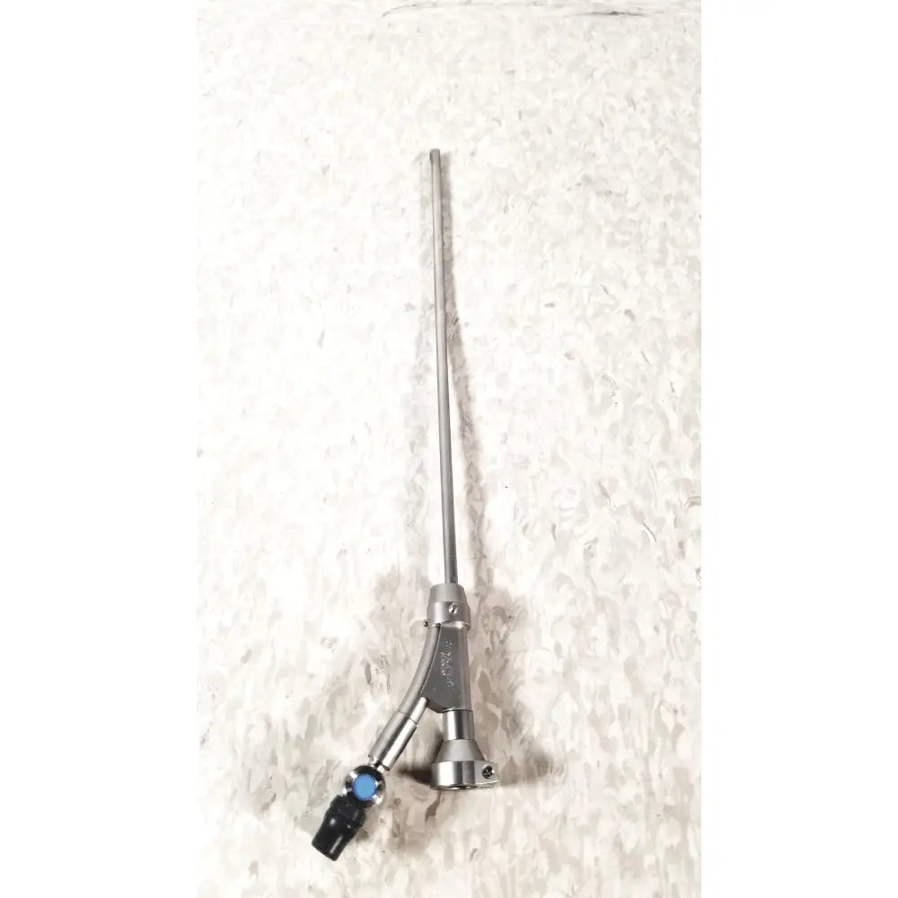 Silver surgical instrument with a long slender shaft and y-shaped blue black handle for Olympus a20975a endoscope bridge
