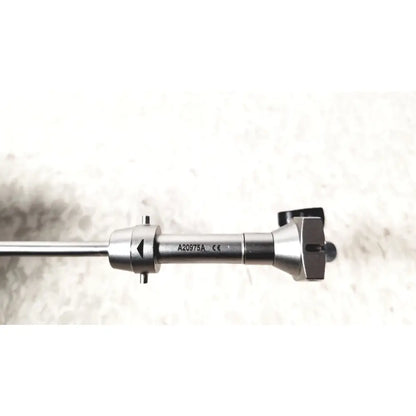 Silver surgical instrument with sleek metallic finish and engraved markings in olympus a20975a endoscope bridge a20975a