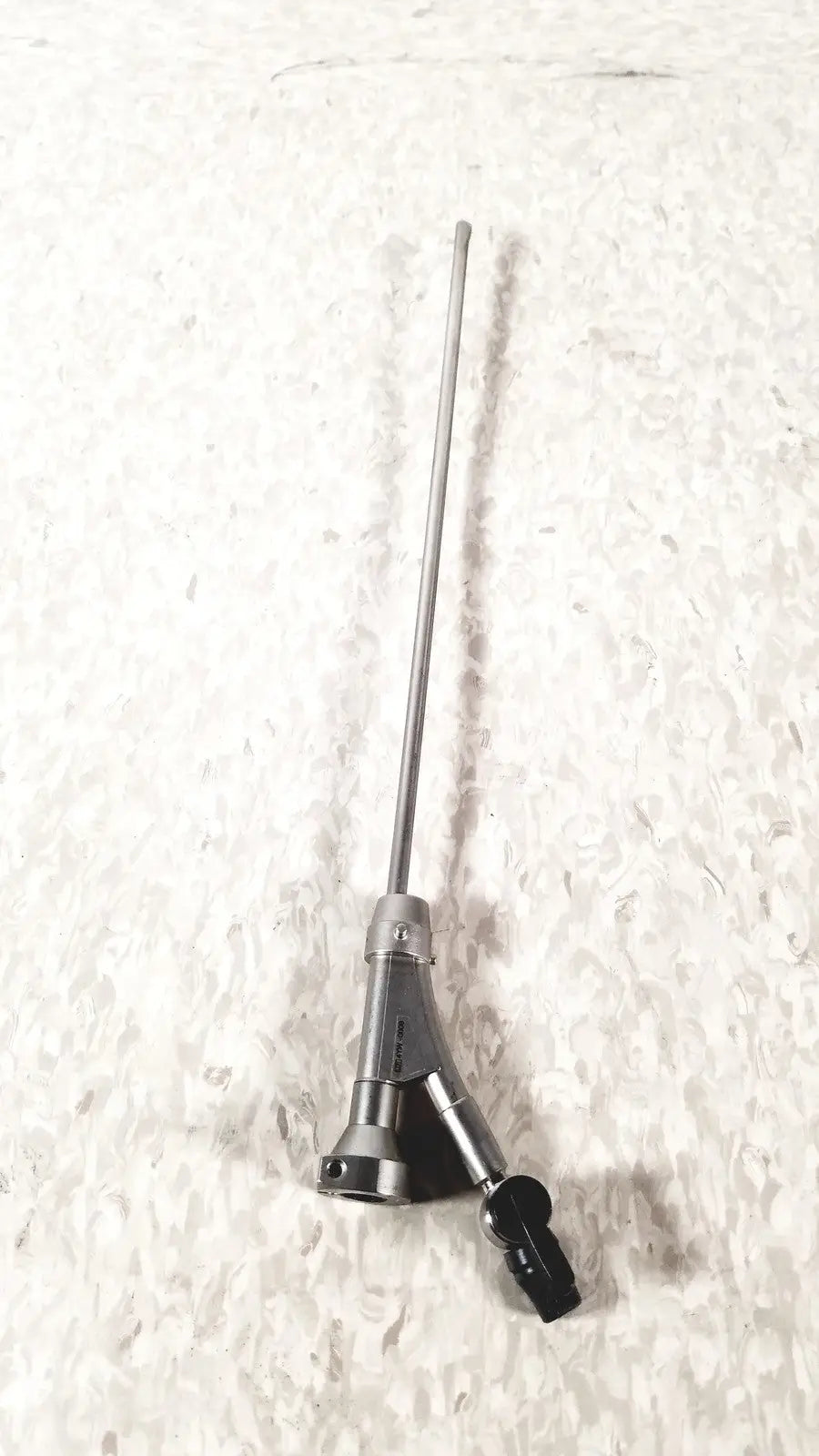 Silver olympus a20975a endoscope bridge with slender elongated shaft and y-shaped connector housing