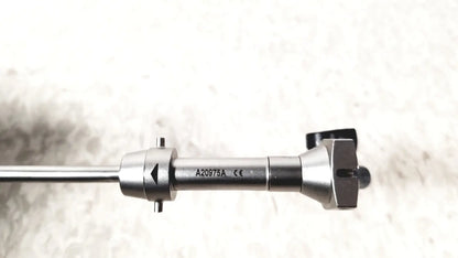 Silver surgical instrument with sleek metallic finish and engraved markings in olympus a20975a endoscope bridge a20975a