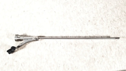 Silver surgical olympus a20975a endoscope bridge with slender metallic shaft and black handled controls a20975a endoscope