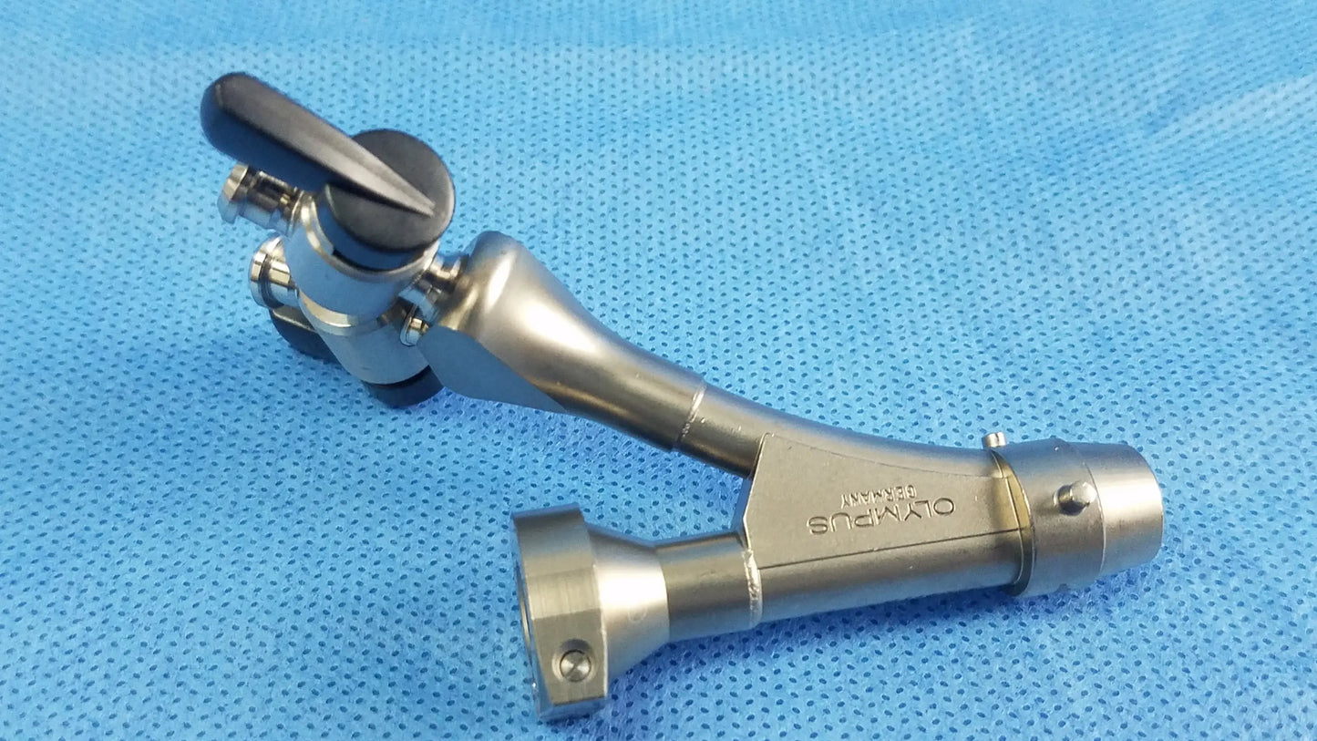 Silver metallic dual channel cysto bridge with black ergonomic handle engraved olympus branding compatible olympus telescope cysto bridge