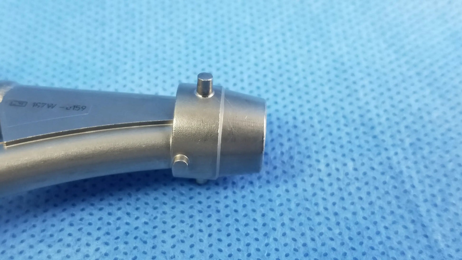 Silver metallic dual channel telescope cysto bridge with cylindrical body and threaded connection, compatible Olympus A20977A cysto bridge