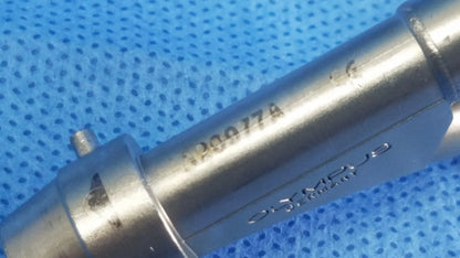 Silver metallic olympus a20977a telescope cysto bridge dual channel lens with engraved markings and sleek cylindrical design
