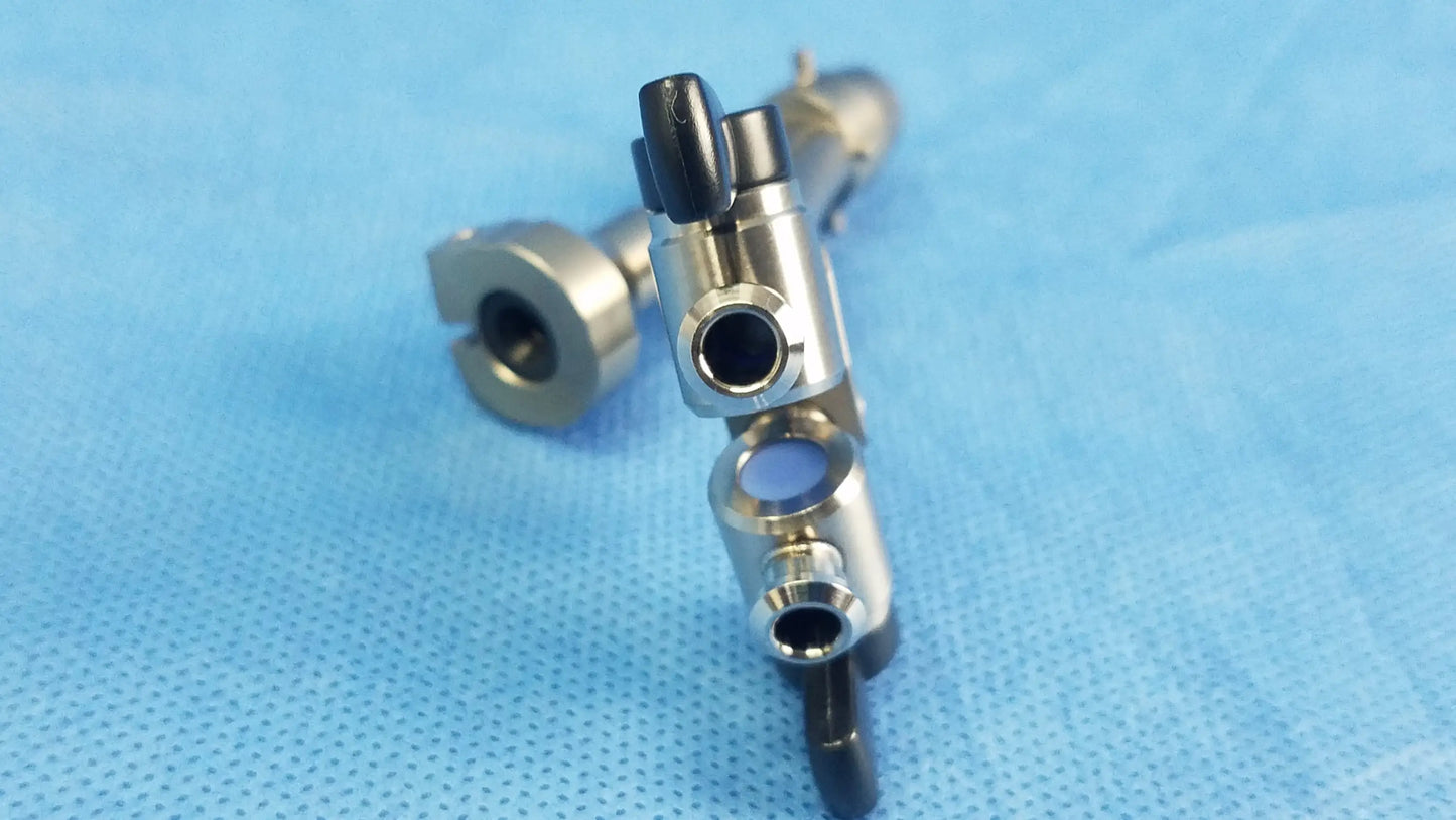 Silver dual channel cysto bridge with black plastic handles and multiple ports compatible olympus telescope cysto bridge